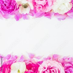 Floral frame of pink roses on white background. Flat lay, top view. Flowers background.