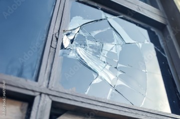 broken glass in a window frame