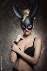charming girl with bizarre bunny mask