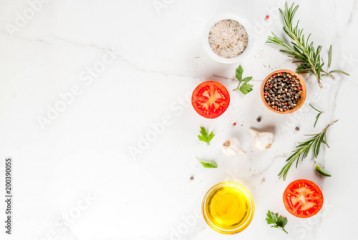 Cooking background, herbs, salt, spices, olive oil, white background copy space top view