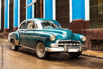 old blue vintage classic american car in the street of havana cuba