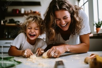 A view of a parent and child engaged in a fun cooking or baking activity, illustrating the joy of culinary bonding, selective focus, shallow depth of field, blurred