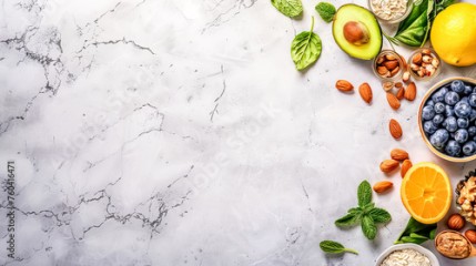 Fresh healthy food ingredients on marble background