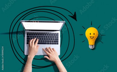 Creativity, inspiration, idea concept with light bulb and laptop computer- Flat lay