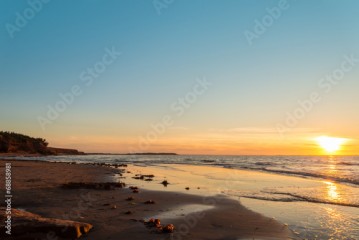 Ocean beach at the sunset