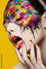 Beautiful fashion woman color face art.