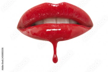 Close-up of red lipgloss dripping from woman's lips over white background