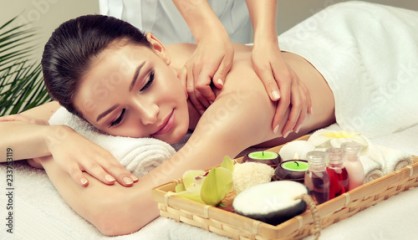 Massage and body care. Spa body massage woman hands treatment. Woman having massage in the spa salon for beautiful girl 