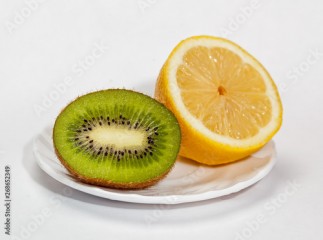 Colored fruit on white background.
