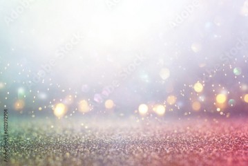 background of abstract glitter lights. blue, silver, pink and white. de focused
