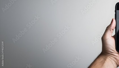 Young man hand holding black smartphone with blank screen isolated on white background